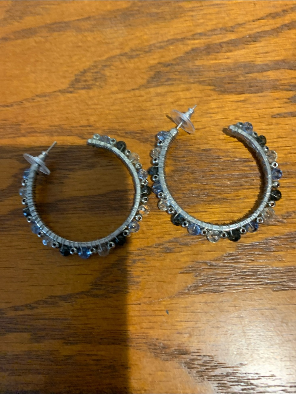 Silver Hoop Earrings with Blue Crystal Accents